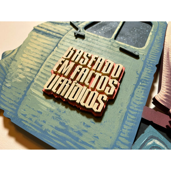 Detailed view of the original acrylic painting on layered wood "Baseado em factos verídicos" by Mário Belém, showcasing the hand-painted typography, the intricate illustrations across different wood levels, and the vibrant storytelling elements.