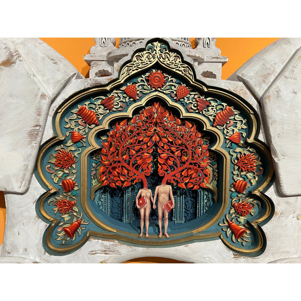Close-up detail of Mário Belém sculpture showing hand-carved temple archway with two painted figures inside