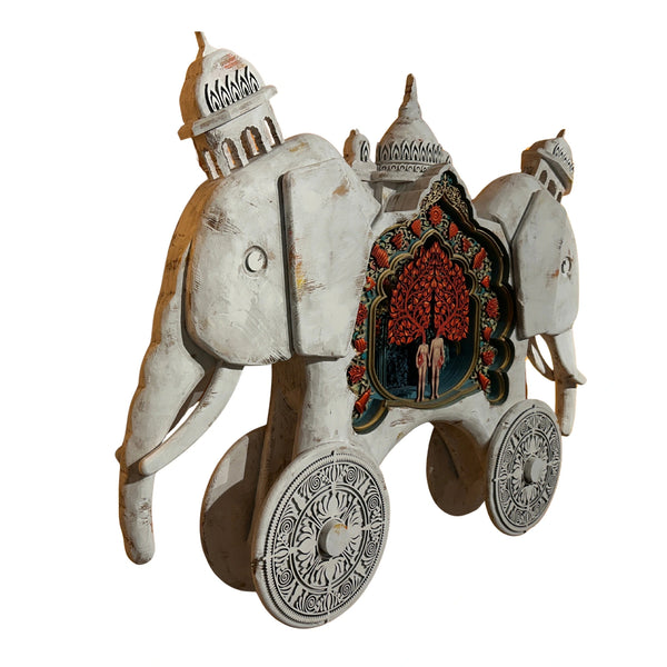 Perspective view of Mário Belém "Don’t tell me stories" wood sculpture showing elephant shape and temple depth