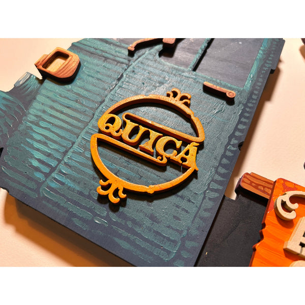 Detailed view of the original acrylic painting on layered wood "Quiçá" by Mário Belém, featuring the central typography, the hand-painted details on the different wood levels, and the vibrant palette of the artist's signature style.