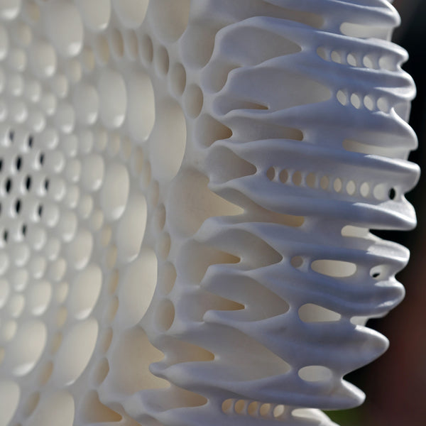 Texture and material detail of the marble sculpture "Vortex" by Matthias Contzen